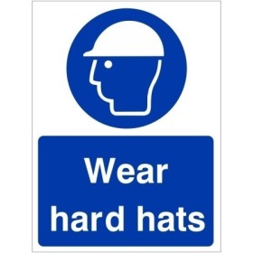Wear hard hats mandatory safety sign with blue background and head protection symbol