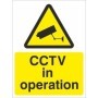 CCTV in operation warning sign with camera symbol and yellow background