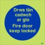 Glow in the Dark Fire Door Keep Locked Door Sign in Welsh/English